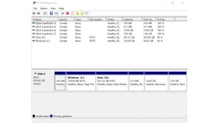 A screenshot showing how to assign a partition to a newly installed storage device on Windows 11
