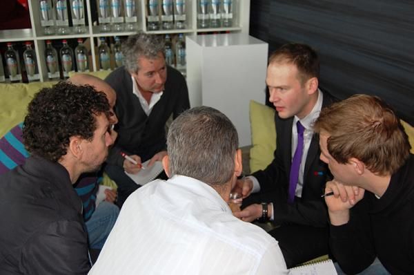 The team management has a pow-wow.