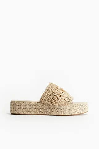 platform sandal made from an espadrille or basket like material