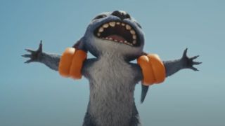 Stitch with orange floaties on his arms putting them out Titanic style in the live-action Lilo and Stitch.