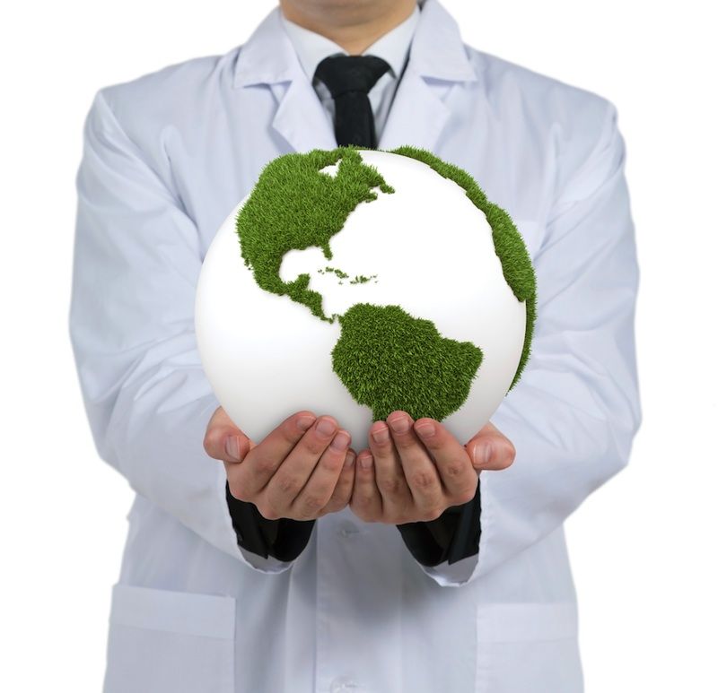 scientist holding a globe