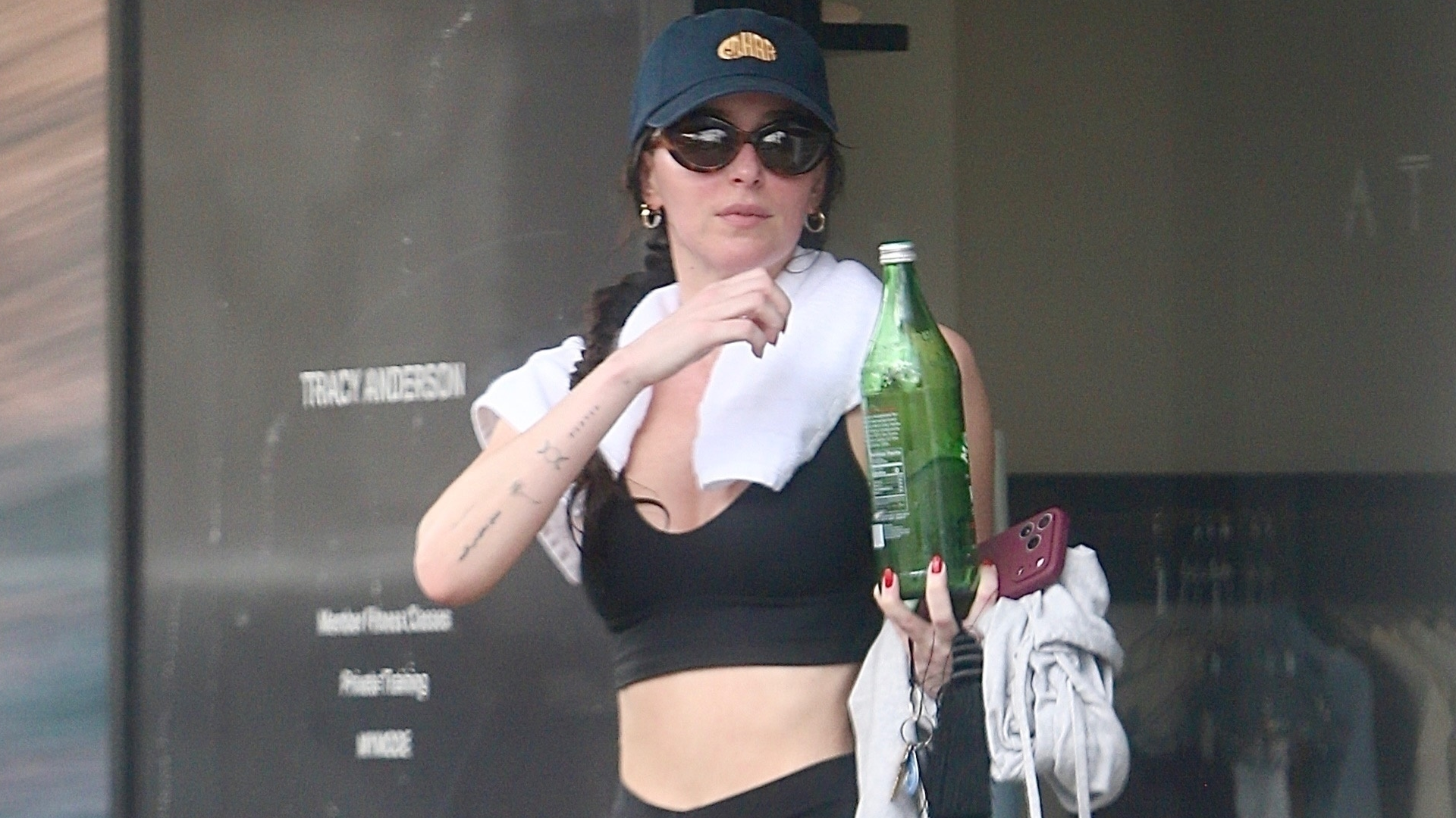 Dakota Johnson was spotted for the first time in 2026 wearing a Lululemon matching set and her favorite Nike V2K sneakers