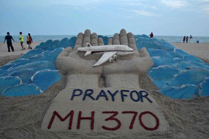 A sand sculpture honoring Flight 370.