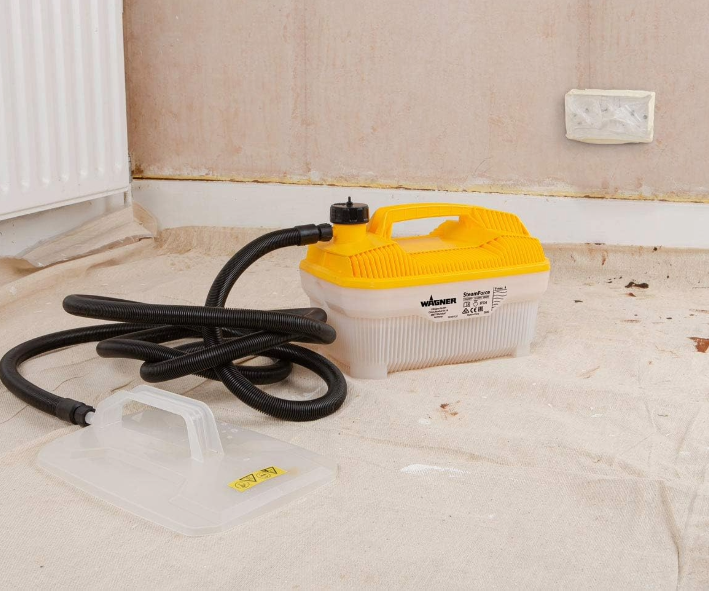 WAGNER Steam Wallpaper Stripper SteamForce on the floor on dust sheet