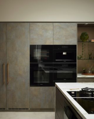 miele ovens in a four-piece format in a tower unit of a modern kitchen