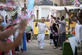 EastEnders' Billy takes Olympic Torch to Walford