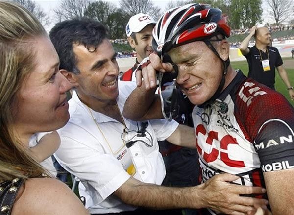 An emotional Stuart O'Grady is greeted by manager Alain Gallopin and wife Anne-Marie