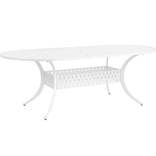 An oval dining table in white