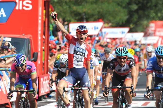 Michael M&oslash;rk&oslash;v (Saxo-Tinkoff) wins ahead of Max Richeze and Fabian Cancellara at the 2013 Vuelta a Espana.