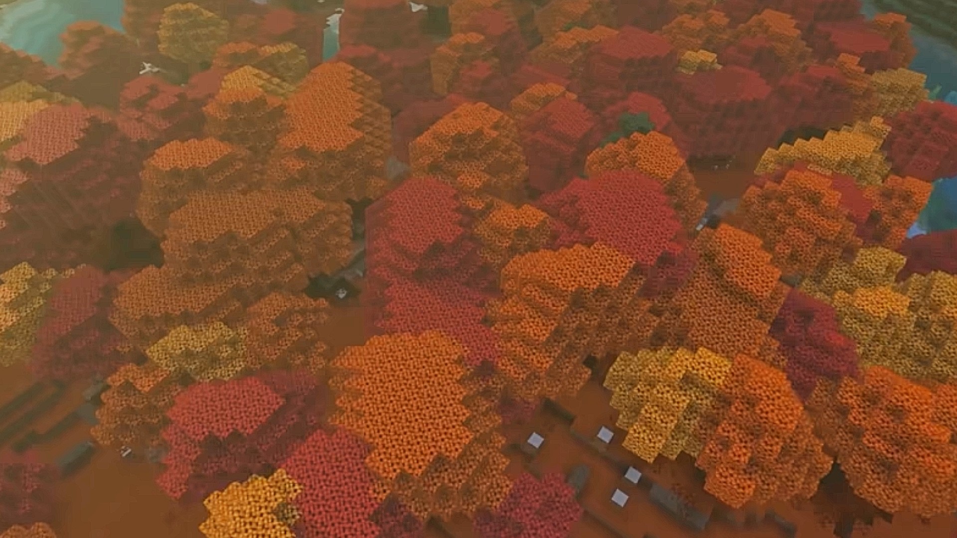 A top-down view of the Dappled Forest from the next Minecraft update, featuring a sea of orange-hued tree tops.