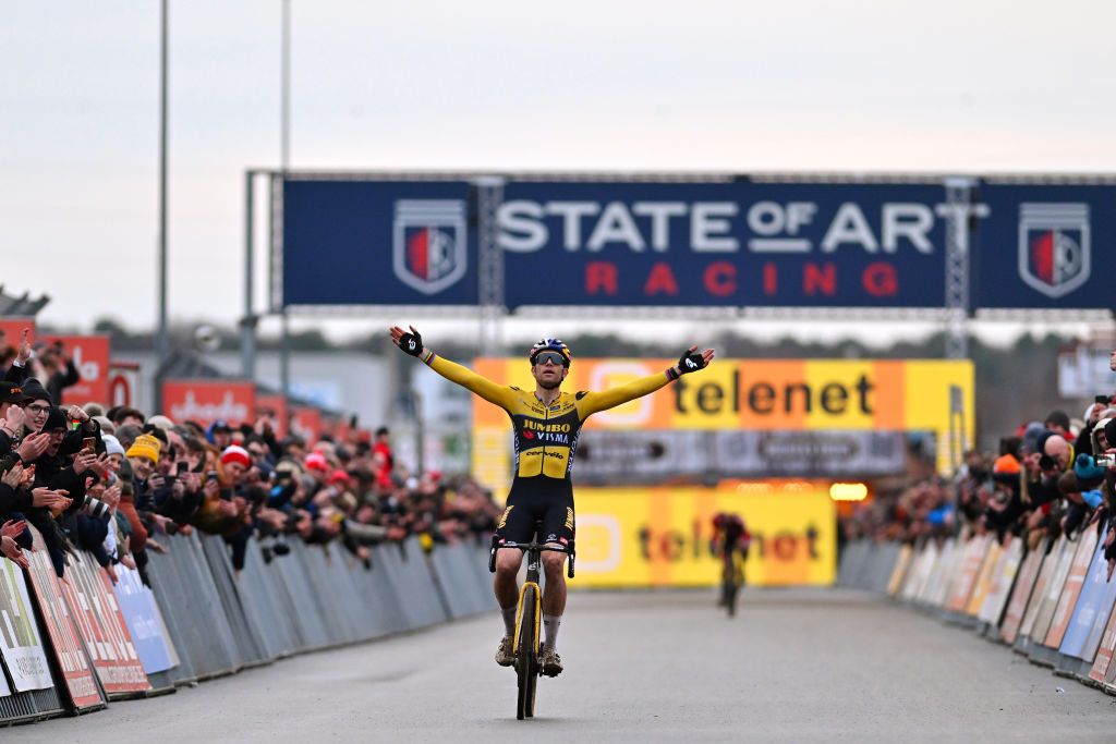 NAMUR BELGIUM DECEMBER 27 Wout Van Aert of Belgium and Team JumboVisma crosses the finish line as race winner during the 19th Superprestige HeusdenZolder 2023 Mens Elite on December 27 2023 in Namur Belgium Photo by Luc ClaessenGetty Images