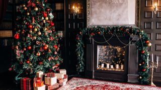 Country house decorated for Christmas, with decorated fireplace and Christmas tree