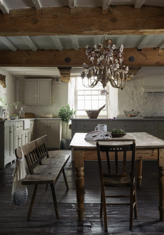 cottage kitchen with antique pieces by deVOL