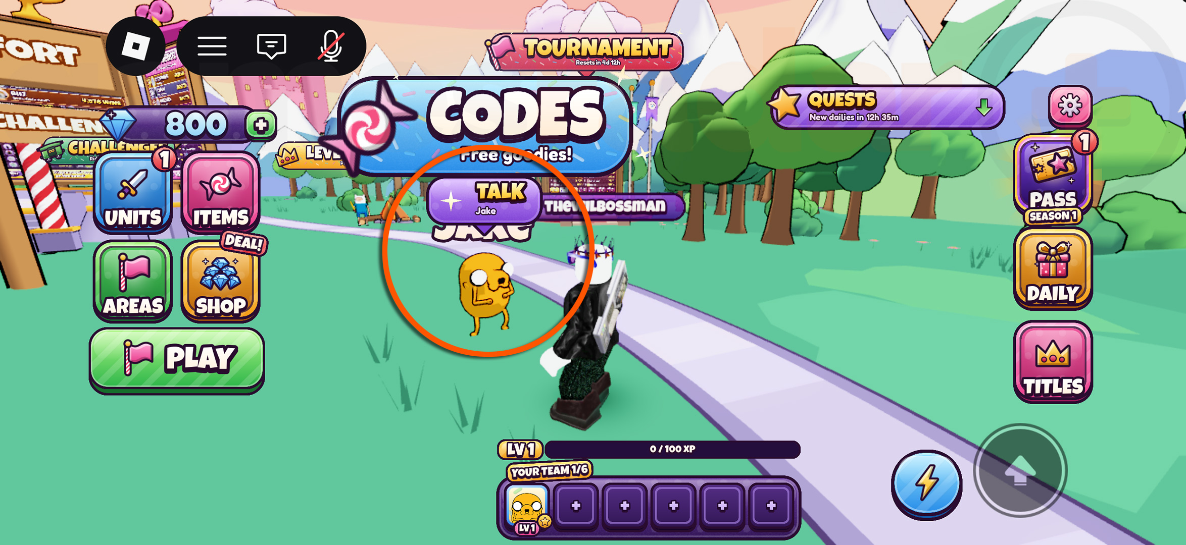 An orange circle indicating how to access the interaction screen with Jake used to redeem Candy Kingdom Defense codes