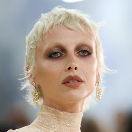 a white woman with a short, blonde pixie cut attends the met gala