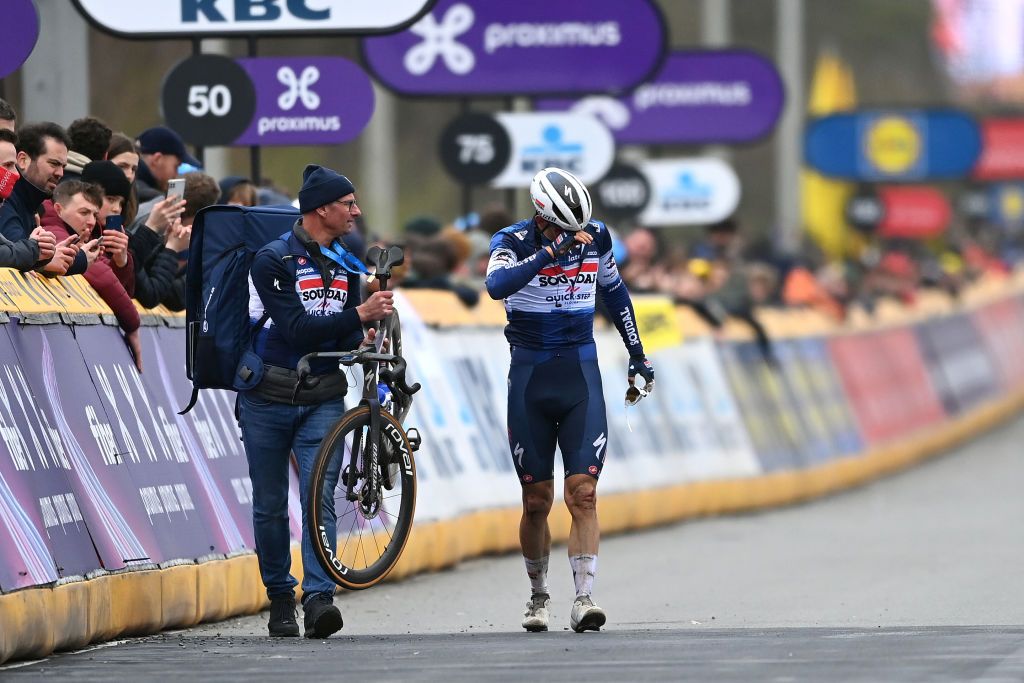 OUDENAARDE BELGIUM APRIL 02 Davide Ballerini of Italy and Team Soudal QuickStep crosses the finish line injured after being involved in a crash during the 107th Ronde van Vlaanderen Tour des Flandres 2023 Mens Elite a 2734km one day race from Brugge to Oudenaarde UCIWT on April 02 2023 in Brugge Belgium Photo by Tim de WaeleGetty Images