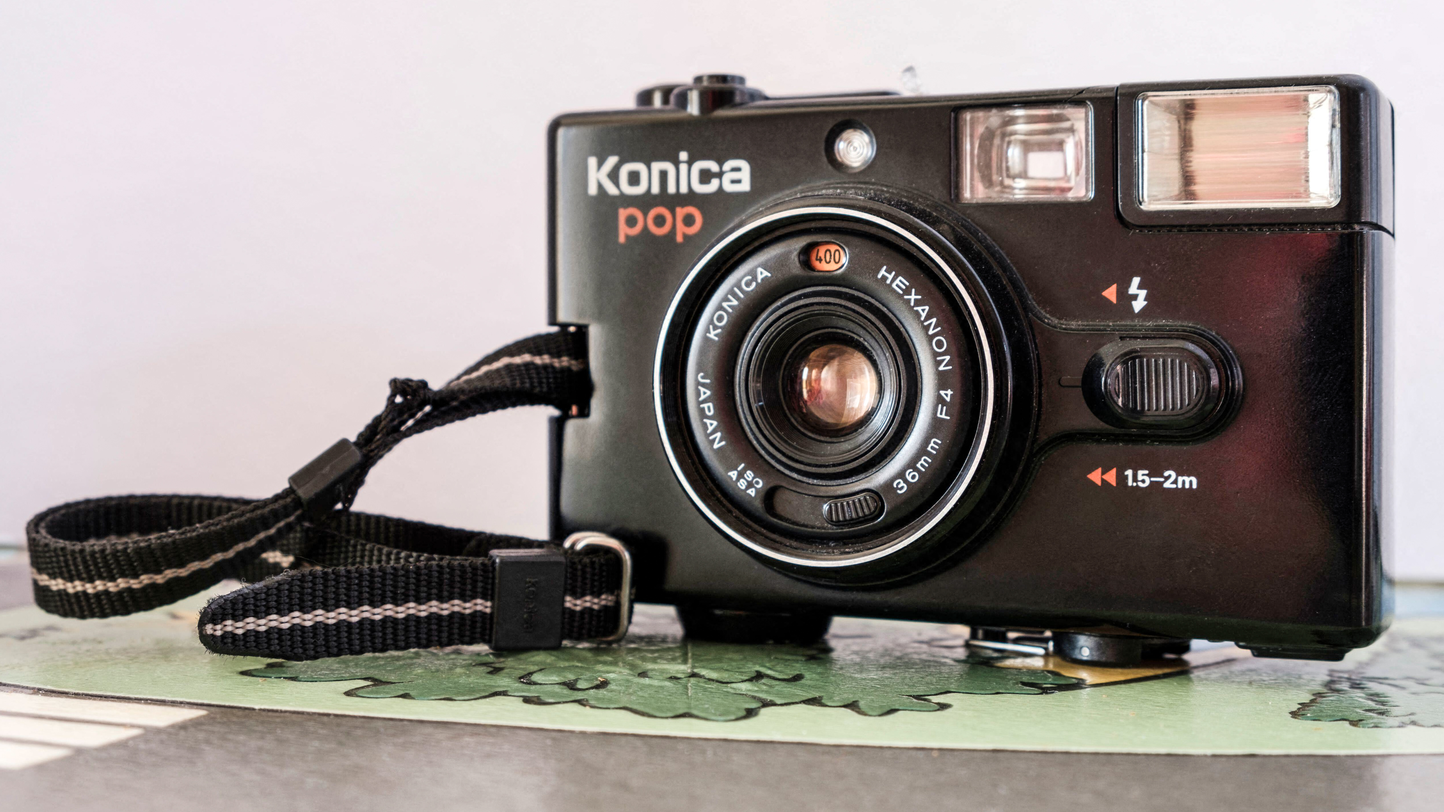 2G7GHG0 Konica Pop 1982 japanese 35mm film camera with high quality Hexanon lens , a symbol of pocket size analogue cameras