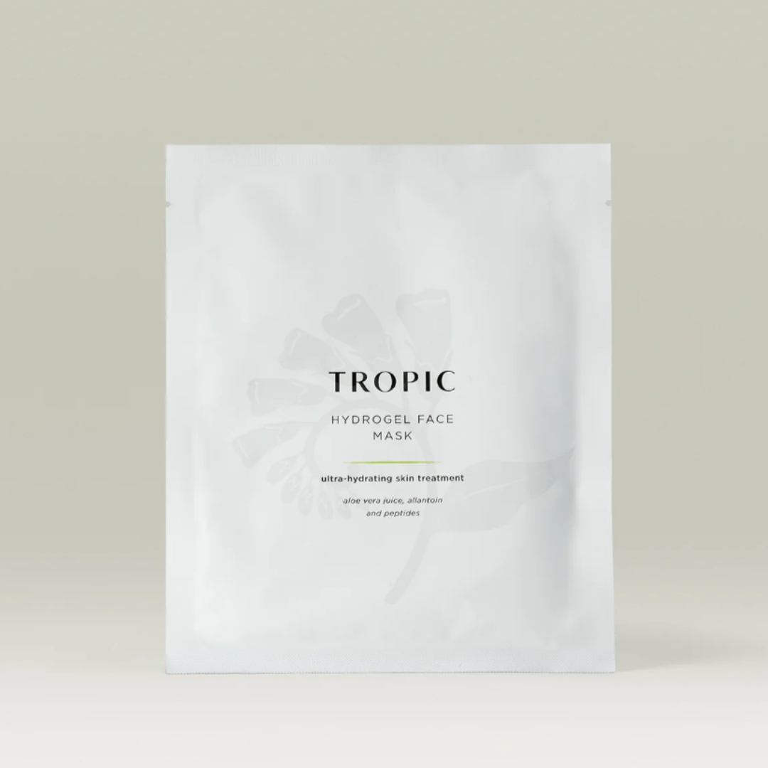 A product shot of the Tropic Hydrogel masks, on a grey background