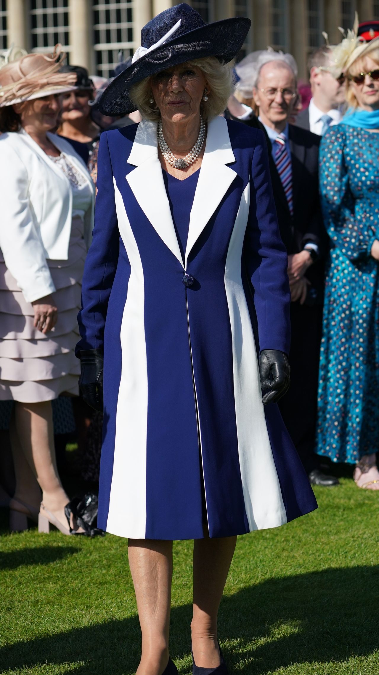Queen Camilla's royal blue coat dress features styling trick Woman & Home