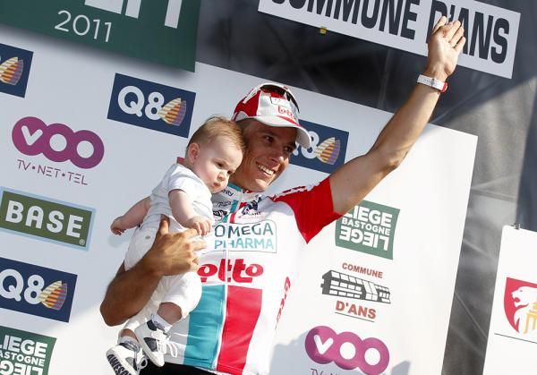 Philippe Gilbert (Omega Pharma-Lotto) with his son on the podium.