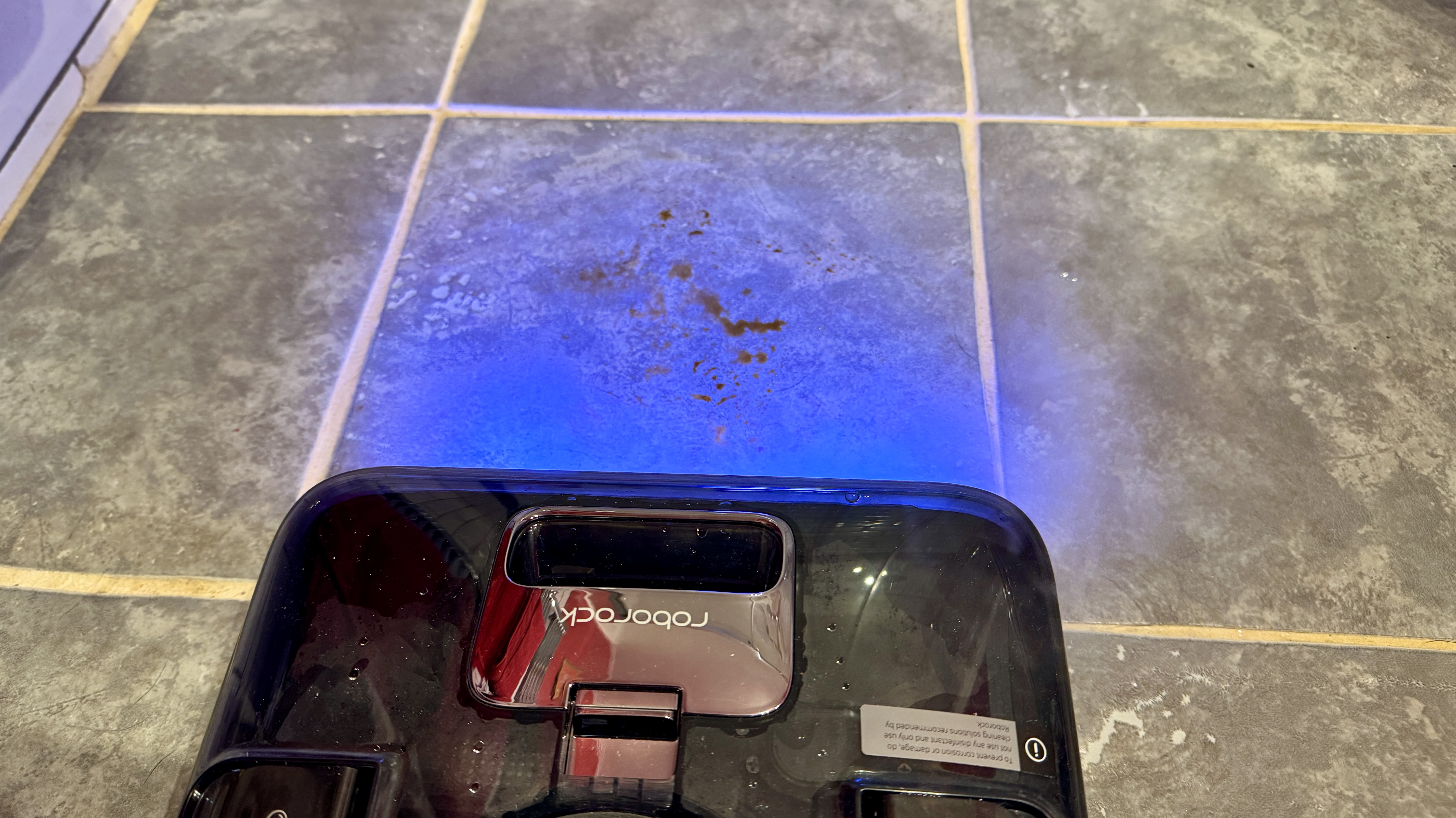 Roborock F25 Ultra emitting steam as it cleans