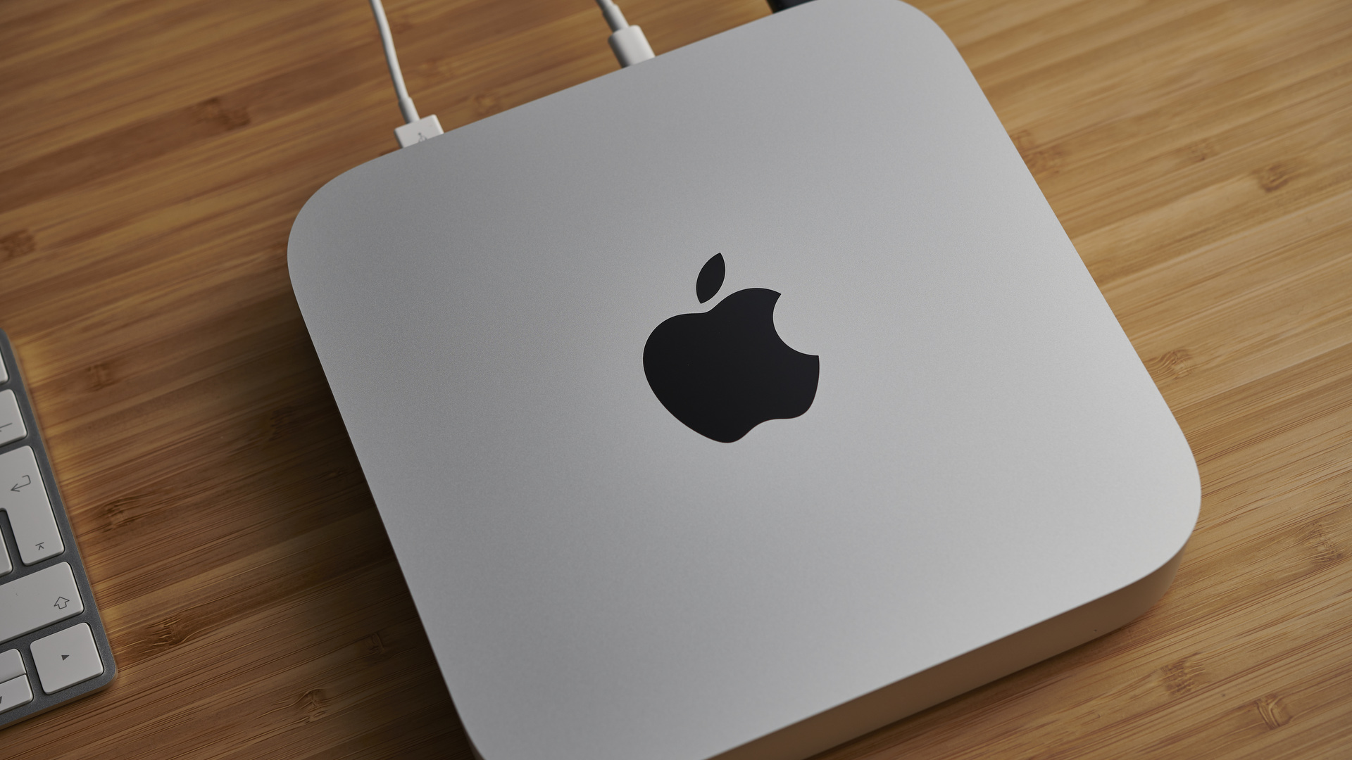 Apple Mac mini (M1, 2020) on a wooden desk