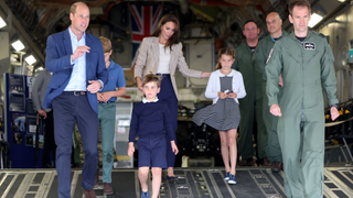 Britain's Prince Louis of Wales (centre left), Britain's Princess Charlotte of Wales (centre right), Britain's Prince George of Wales (2L), Britain's Catherine, Princess of Wales (C) and Britain's Prince William, Prince of Wales (L) walk down the ramp of a C17 during a visit to the Air Tattoo at RAF Fairford on July 14, 2023 in Fairford, central England