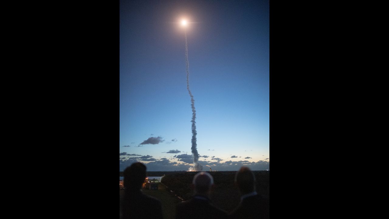 Florida Gov. Ron DeSantis (left), Tory Bruno, president and CEO of the United Launch Alliance, and NASA Administrator Jim Bridenstine watch from NASA&rsquo;s Kennedy Space Center in Florida as a United Launch Alliance Atlas V rocket with Boeing&rsquo;s CST-100 Starliner spacecraft on board launches from Space Launch Complex 41 at Cape Canaveral Air Force Station, on Dec. 20, 2019.