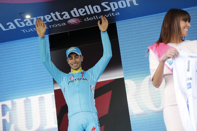 Fabio Aru arrives on the podium to collect his best young riders jersey