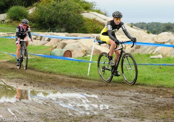 Elle Anderson (Ladies First Racing) leading Gabby Day around some puddles