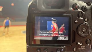 Back of a Canon camera, demonstrating the Registered People Priority mode using registered faces of a basketball team