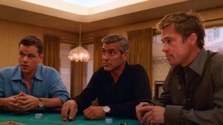 From left to right: Matt Damon, George Clooney and Brad Pitt all sitting around a blackjack table.