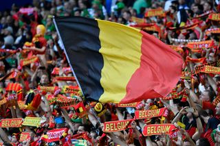 Belgium fans fly their flag during the Euro 2016 group E football match between Belgium and Ireland at the Matmut Atlantique stadium in Bordeaux on June 18, 2016.