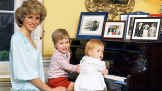 Diana, Princess of Wales with her sons, Prince William and Prince Harry, at the piano in Kensington Palace in 1985