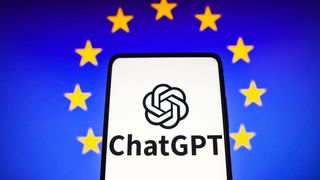 In this photo illustration, the ChatGPT logo is seen displayed on a smartphone and the flag of the European Union on the background.