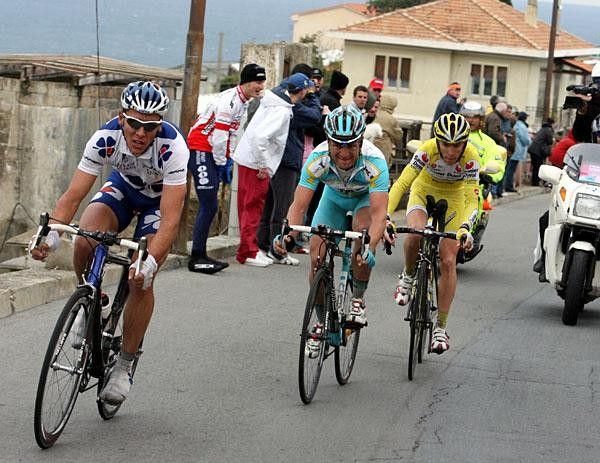 Gilbert leads Kessler and Ricco near the Poggio summit.