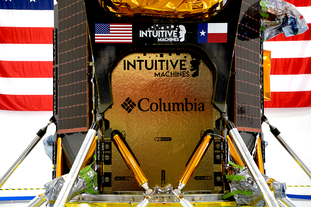 a roughly cube-shaped spacecraft covered in gold foil