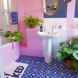 bathroom with candy pink and dark blue colour combination