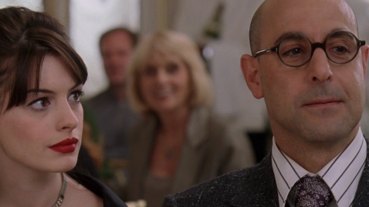 Andy looking at Nigel in The Devil Wears Prada