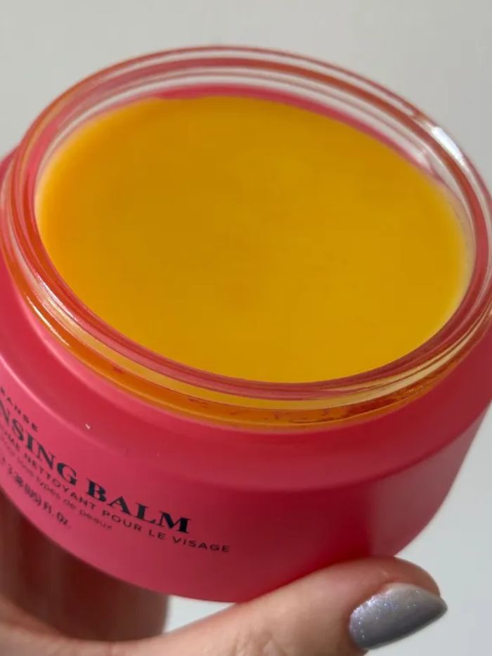 Grace Day holding the Skin Rocks The Cleansing Balm