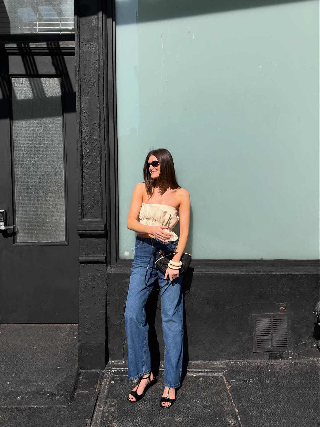 An image of a woman wearing timeless summer outfit