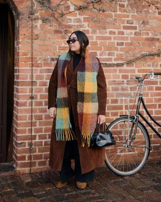 Girl in cute coat and scarf