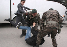 Turkish PM's aide caught on camera kicking mine protester