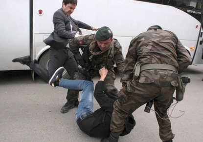 Turkish PM&amp;#039;s aide caught on camera kicking mine protester