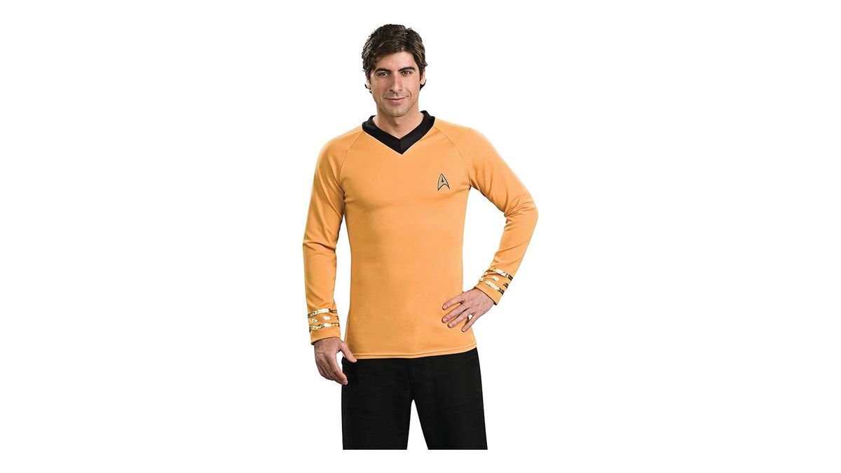 A man wearing a Captain Kirk top on a white background.