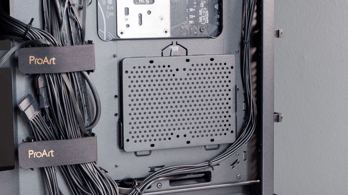 A gaming PC in the process of being built, using Radeon and Ryzen components and an Asus Pro Art PA401 PC case.