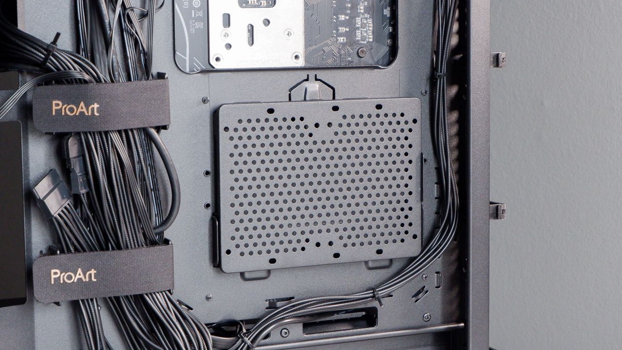 A gaming PC in the process of being built, using Radeon and Ryzen components and an Asus Pro Art PA401 PC case.