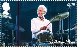 Late drummer Charlie Watts features on Stamp 8, performing in Düsseldorf, Germany, in October 2017
