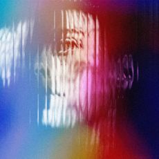image of a woman's face behind a rainbow mirror