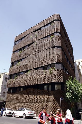 The house of 40 knots designed by Habibeh Madjdabadi and Alireza Mashhadimirza with contemporary facade.